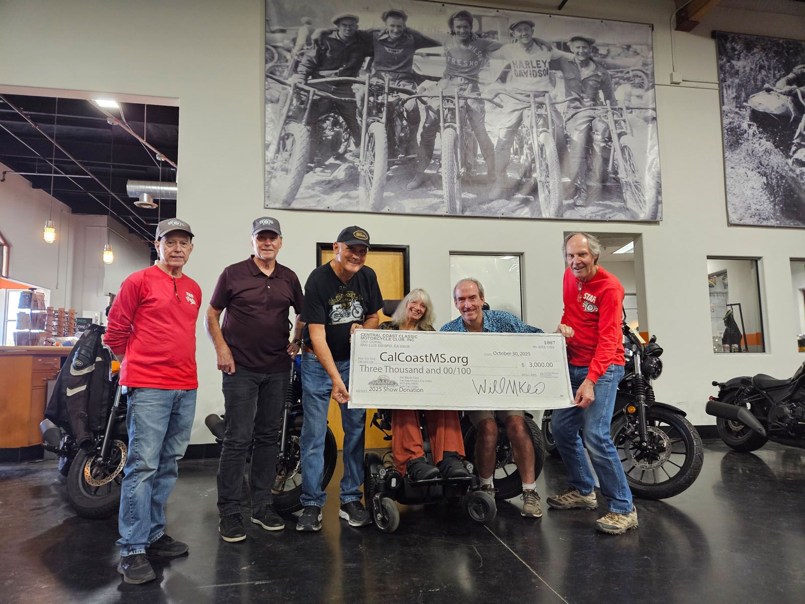 CCCMC presenting a $3000 check to Steve and Sam Mead of CalCoast MS